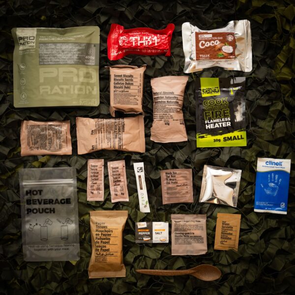 HALF_DAY_MENU_II a group of packages on a green surface