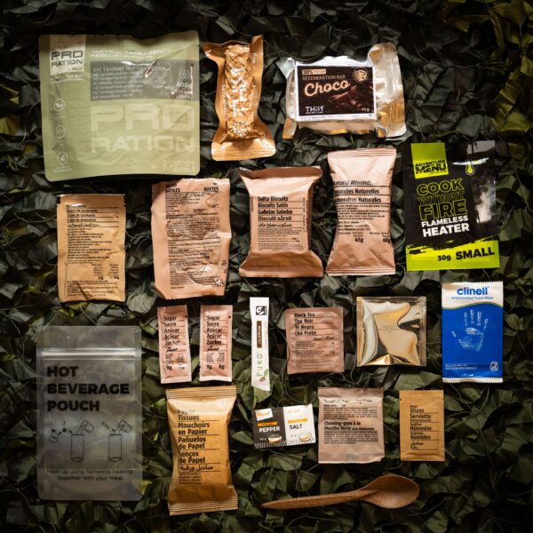 HALF_DAY_MENU_VEGE a group of packages on a camouflage surface